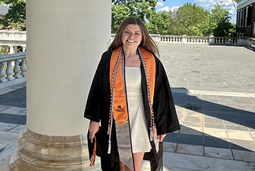 girl in graduation cap and gown